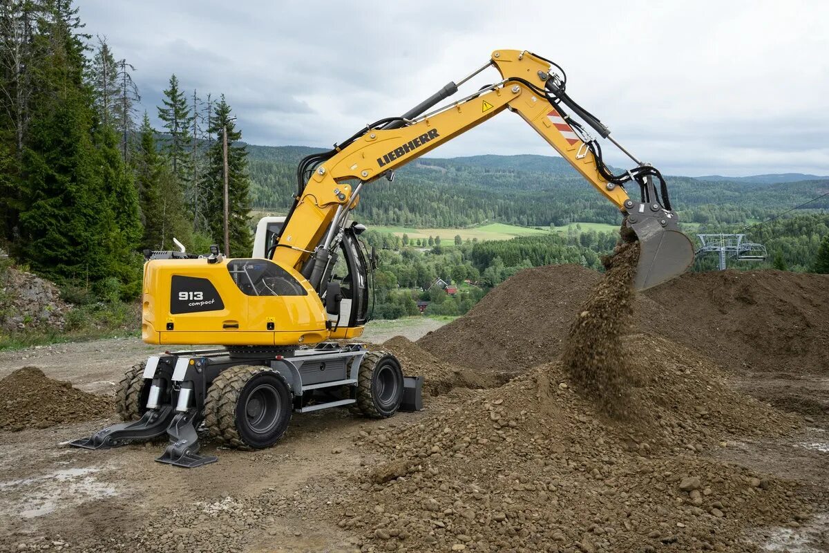 Вертикальный экскаватор. Либхер экскаватор колесный. Liebherr a 913 Compact Litronic Excavator. Колесный экскаватор «Liebherr a 920 Litronic». Колесный экскаватор "Liebherr a 916 Litronic".