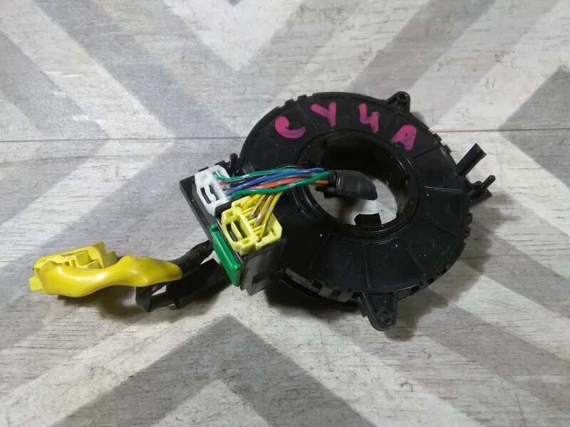 Подрулевой шлейф лансер 10 замена. 8591009b30 подрулевая улитка. подрулевой шлейф лансер 10. датчик угла поворота руля лансер 10. улитка лансер 10.
