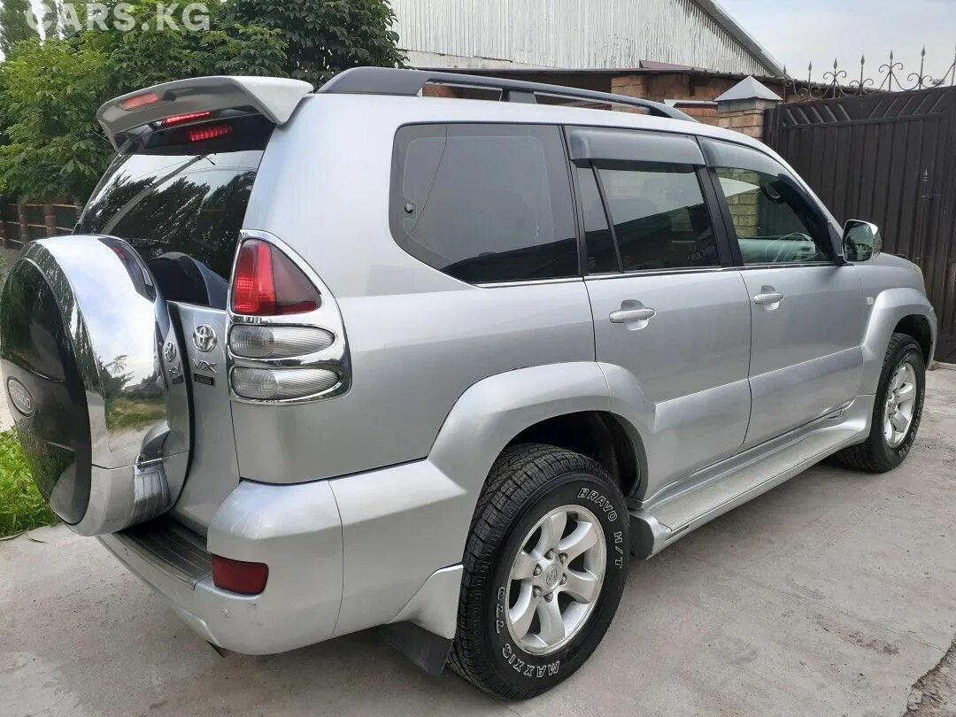 Toyota Land Cruiser Prado j120. Спойлер Тойота ленд Крузер Прадо 120. Toyota Land Cruiser Prado j150 кронштейн. Прадо 120 с боку.