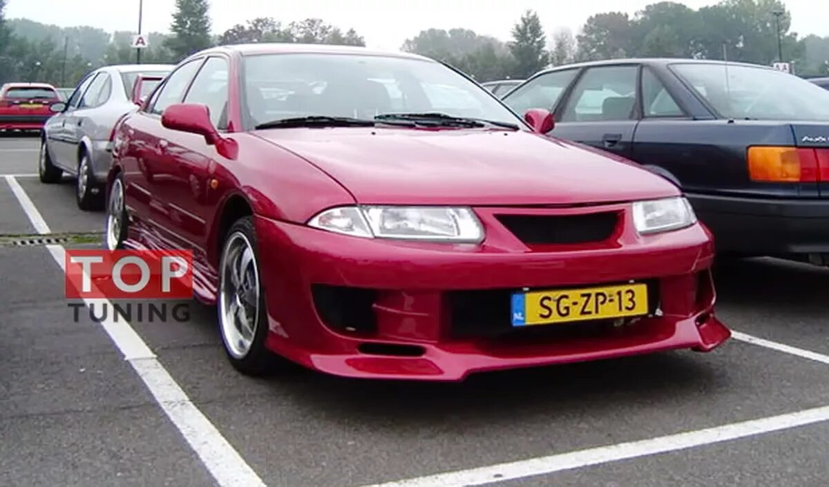 Передний бампер - тюнинг Auto-R GT на Mitsubishi Carisma 1