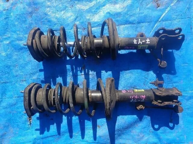 Стойка задняя королла 110. Toyota corolla ee101. Стойка toyota corolla e120. Подвеска тойота ae100. Стойки королла 110.