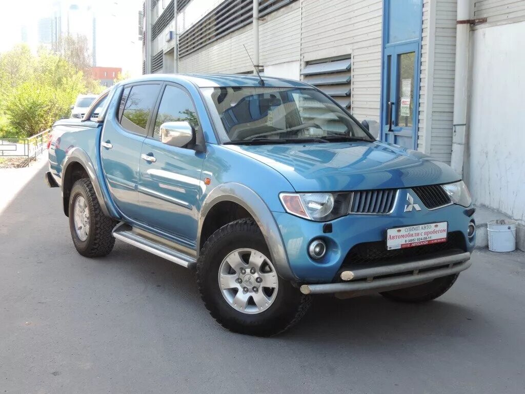 Мицубиси l200 2010. Митсубиси л 200 голубая. Мицубиси л200 2010. Mitsubishi l200 2010 года.