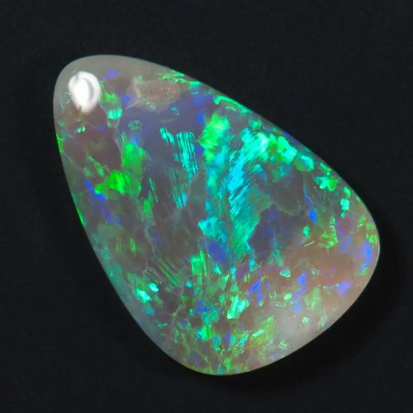 Самоцветы камни опал. Опал камень талисман. Болдер опал. Лунный камень или белый опал. Короитовый опал.