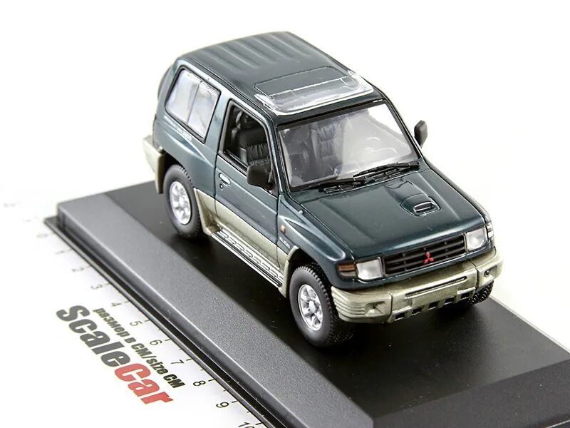Модель митсубиси аутлендер xl 1:43. Mitsubishi lancer evolution 1 43. Mitsubishi 1 43. Mitsubishi 1 43. Pajero 2 minichamps 1:43 4 doors.