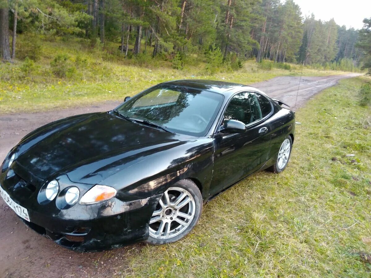 Купе 2000 годов. Hyundai Tiburon 2000. Хендай Тибурон 2000. Hyundai Tiburon 1 Rd Рестайлинг. Hyundai Tiburon i (Rd) Рестайлинг 2000.