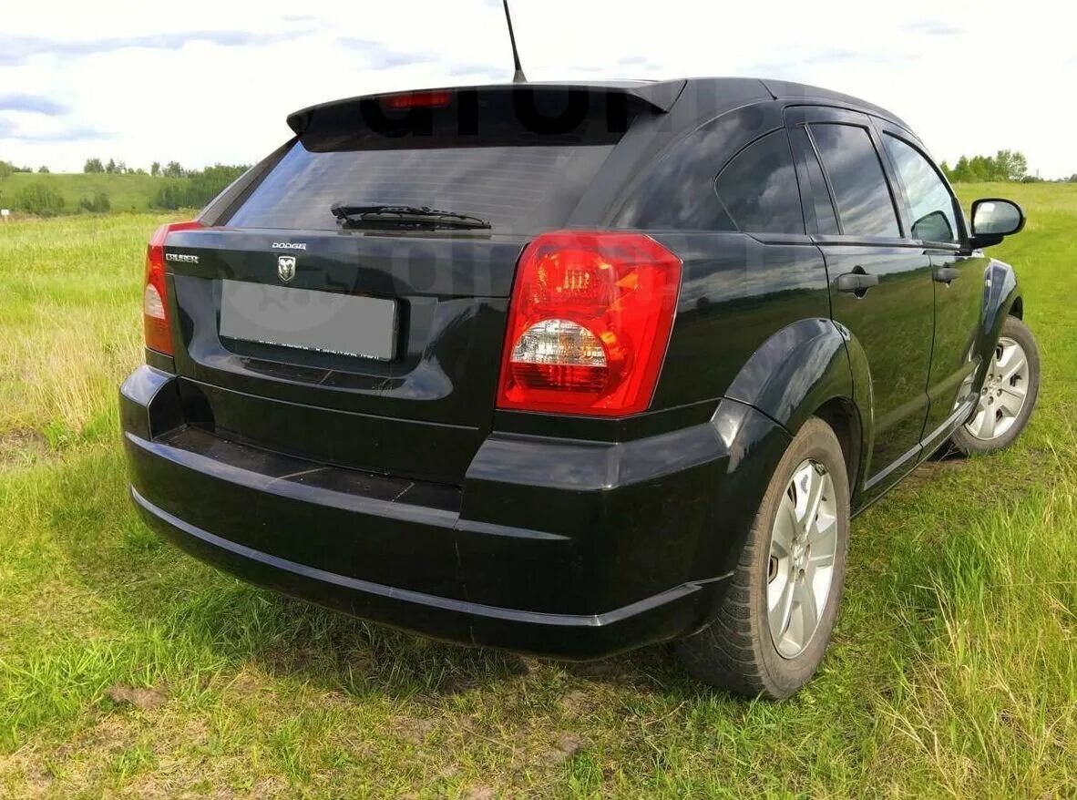 Купить додж бу авито. Dodge Caliber 2007. Додж Калибр 2007 зад. Dodge Caliber, 2007 года черный. Додж Калибр РСТ.