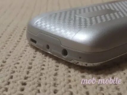 Как снять заднюю крышку телефона maxvi