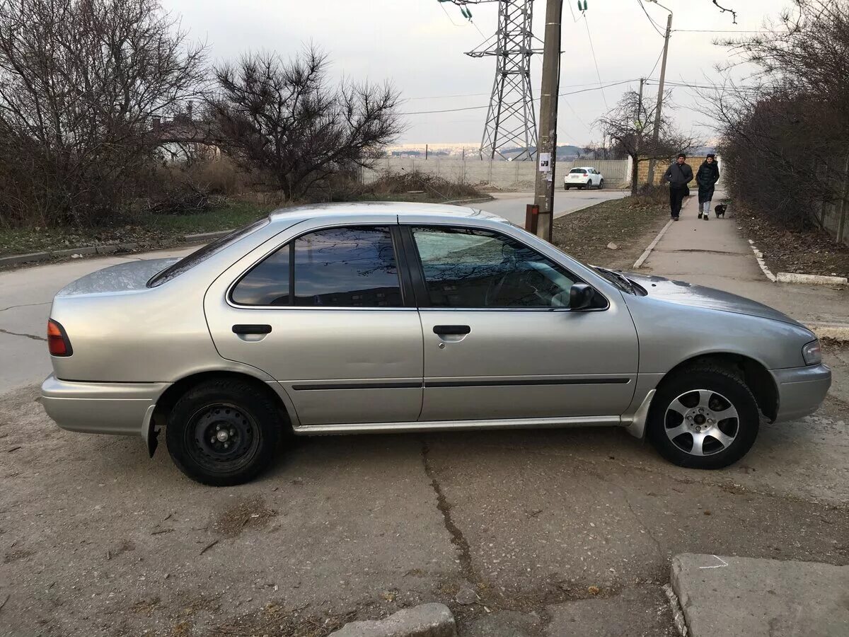 Ниссан санни 14 кузов. Nissan Sunny b14. Nissan Sunny 1997. Ниссан Санни 1997.