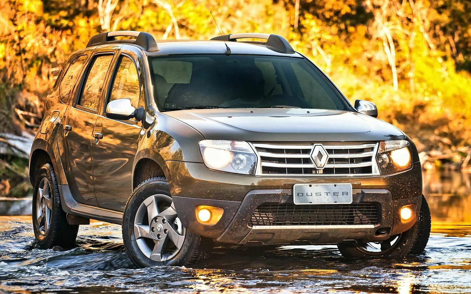 Renault duster года выпуска. Renault Duster 1. Renault Duster 2010. Кроссовер Рено Дастер. Renault Duster 2011.