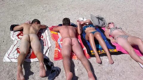 having their boyfriends in the nude on the beach. showing them each other. ...