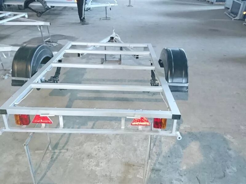 легковой прицеп славич 325. 5 на 1. прицеп трейлер 82940t 1. запчасти для буран в прицепе. прицеп 835305 специальный тентованный.