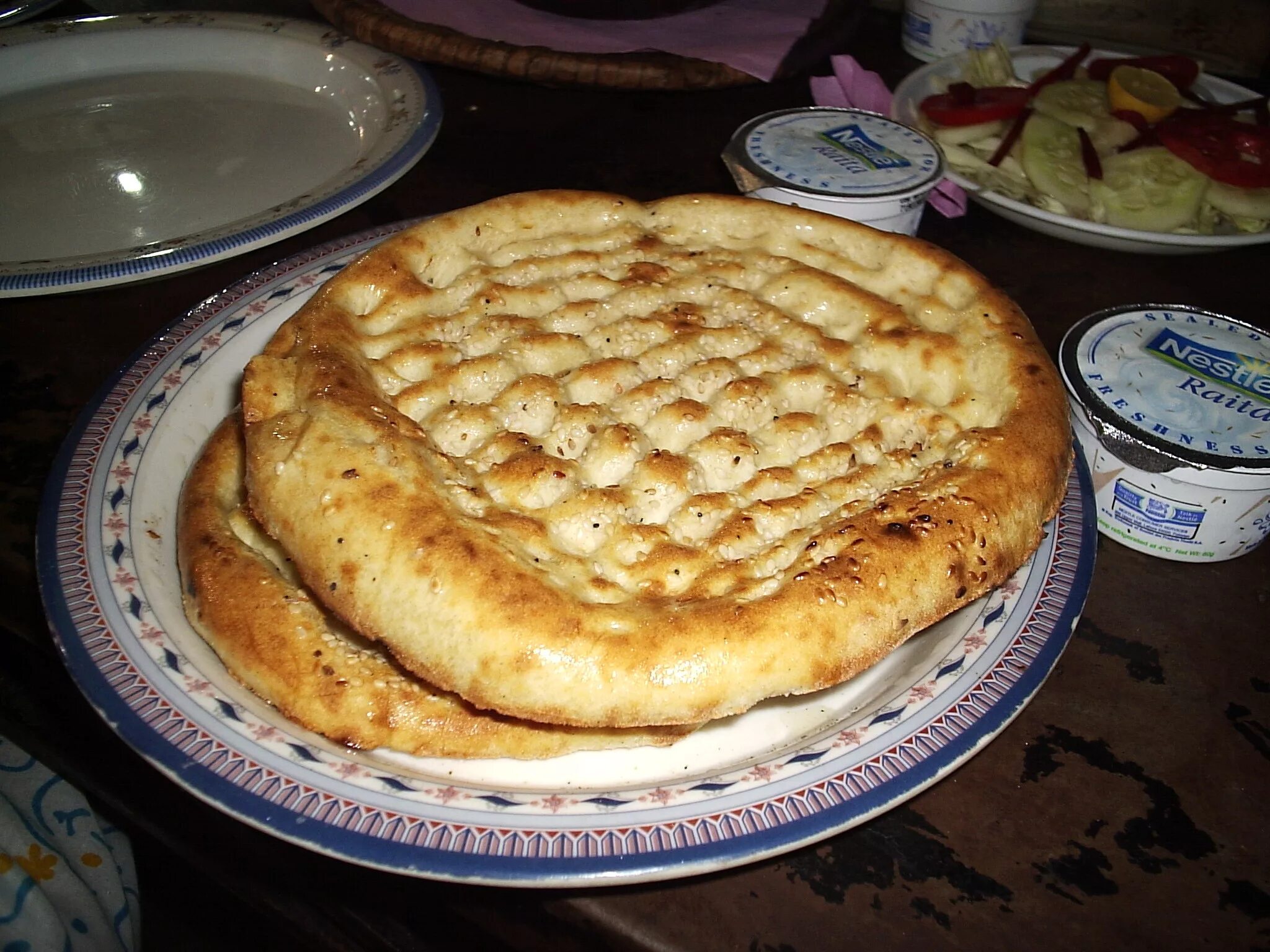 Cannot round nan. Индийская лепешка наан. наан пакистан. roghni nan. лепешка нан индия.