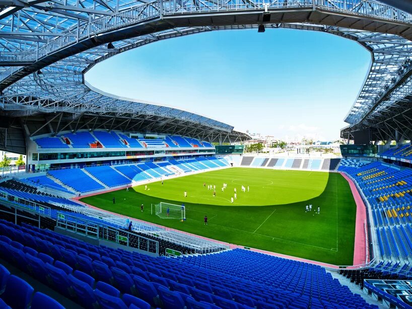 Стадион окончание. Футбольные стадионы Южной Кореи. Футбольный стадион Арена. Стадион Драгау. Футбольная Арена в Южной Корее.