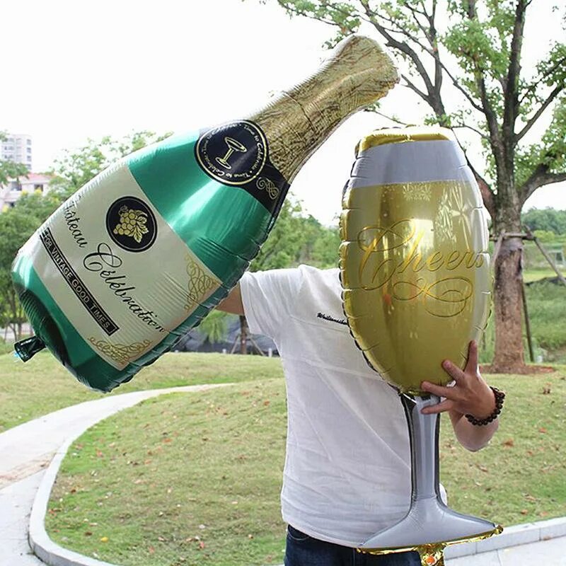 Огромная бутылка шампанского. Большой бокал шампанского. Воздушный шар бутылка шампанского. Огромный бокал.