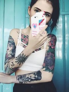 Girl getting tattoo