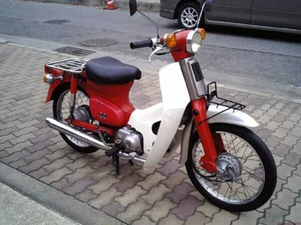 Хонда каб 50 купить. Honda super Cub 50. Honda super Cup 50. Японский мопед Honda super Cub 50. Honda super Cub 50 Custom.