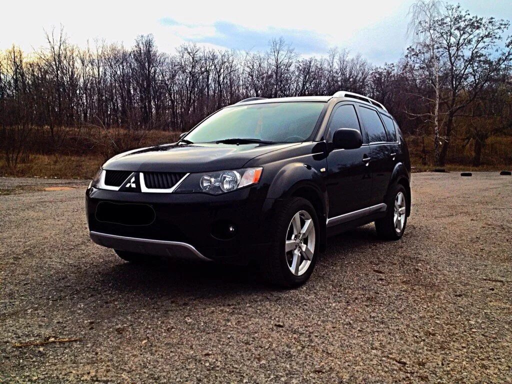 Мицубиси хл 2008. Mitsubishi Outlander XL 2008. Mitsubishi Outlander XL 2012. Митсубиси Аутлендер IX L. Mitsubishi Outlander XL 2.4.