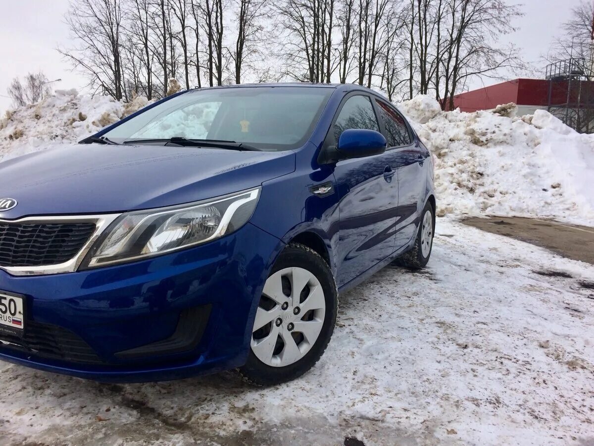 Купить машину 2014 года. Kia Rio 2014. Kia Rio 2014 голубая. Kia Rio 2014 синяя. Kia Rio 2014 года.