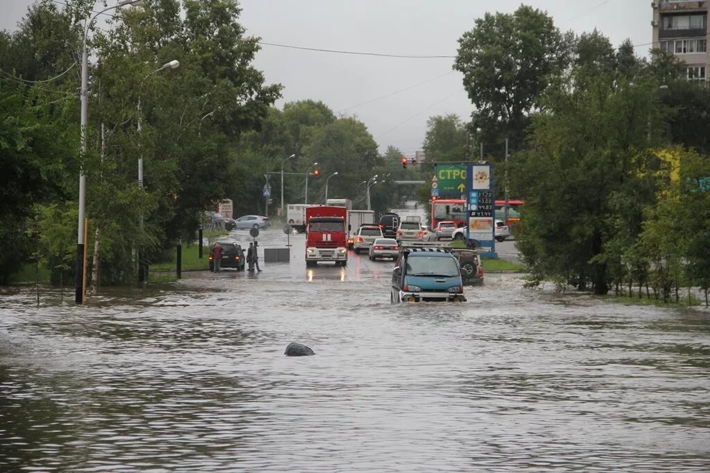Река амур паводки наводнения. Амур 2013 год хабаровск наводнение. Наводнение 2021 года в амурской области. Амурская область 2013 год наводнение фото. Наводнения в россии амурская область 2013.