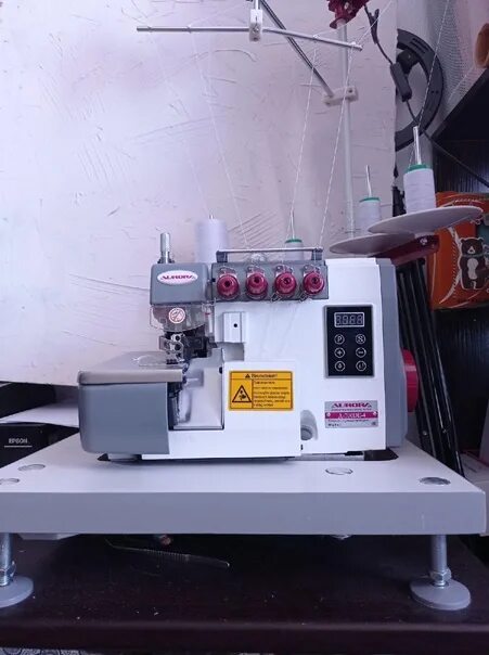 Оверлок aurora a 700de. Оверлок &quot;aurora a-700-dе-4. оверлок aurora a-700d-5. оверлок со столом aurora a-900de-5.
