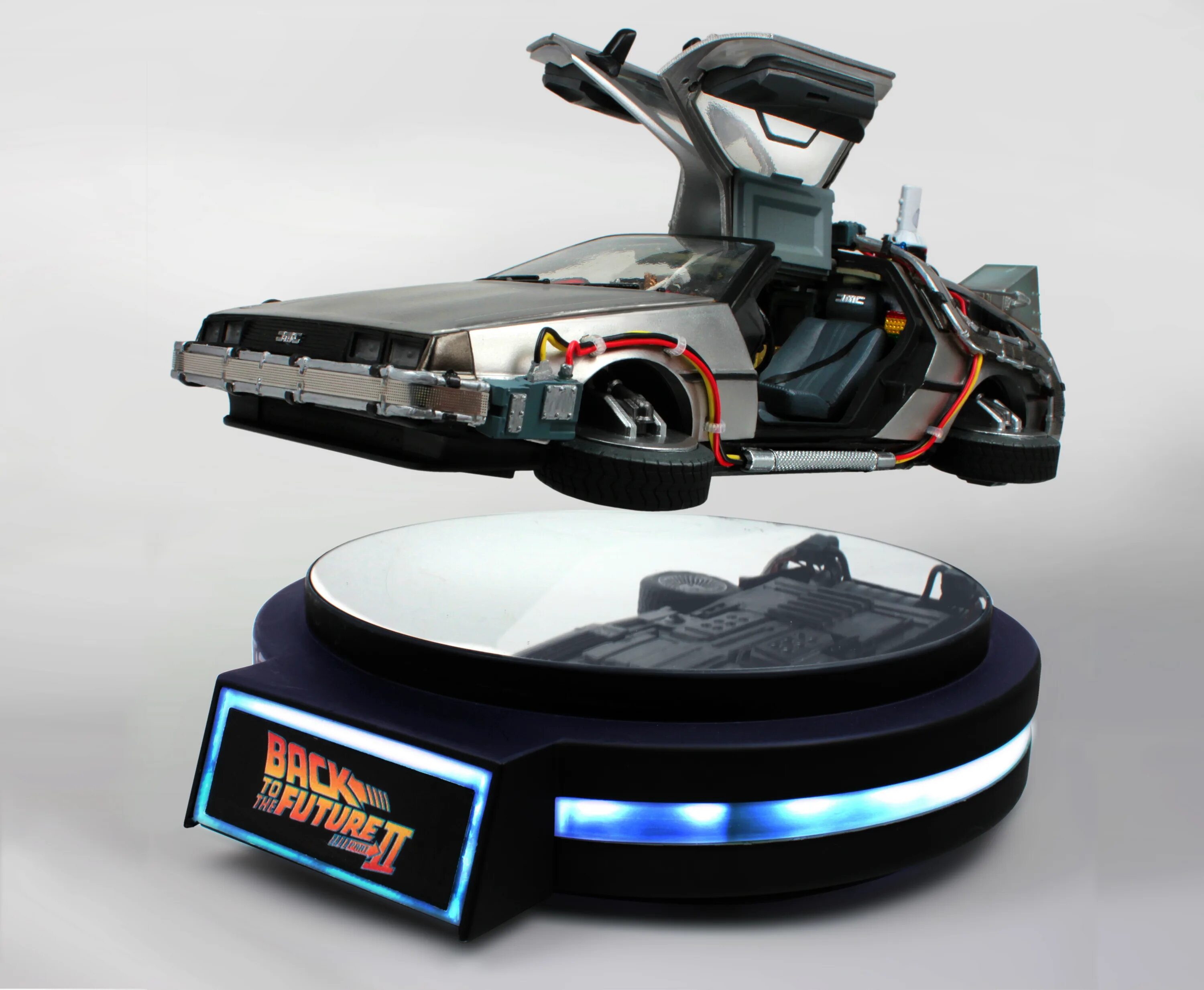 Купить будущие. Фигурка back to the Future Part II 1/20 Magnetic Floating DELOREAN time Machine. Левитирующий Делориан. Левитирующий DELOREAN. Летающий ДЕЛОРЕАН. Левитирующий DELOREAN DMC-12.