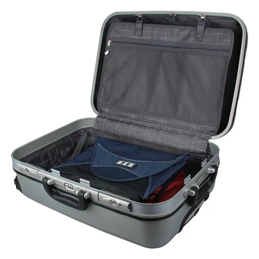 Рубашка в чемодане. Сложенная одежда и помятая. Футляр для рубашки. Одежда свернутая в чемодане. Рубашка в чемодане.