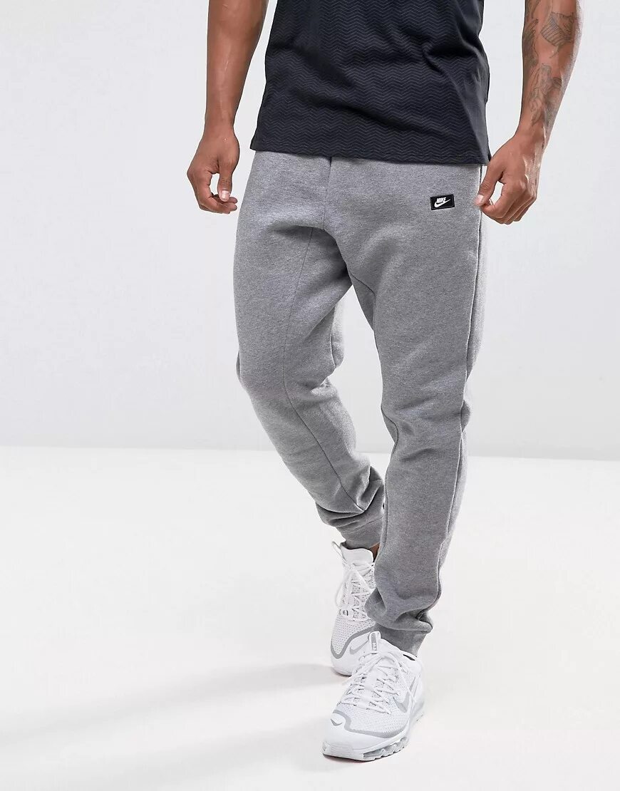 скинни джоггеры. джоггеры supreme спортивные. джоггеры мужские 2021. джоггеры nike air max мужские. описание джоггеров.