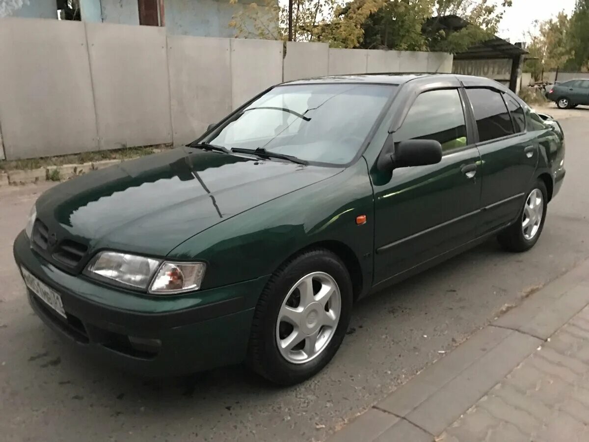 Ниссан 98 год купить. Nissan primera 1997 года. Nissan primera p11 седан 1997 зеленая. Nissan primera 1.6 МТ, 1997. Nissan primera p11 зеленая.