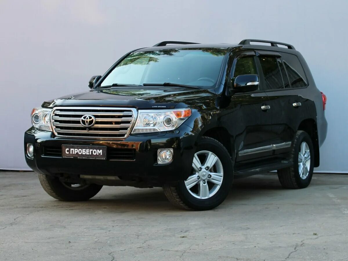 Купить круизер 200. Toyota Land Cruiser 2013. Toyota Land Cruiser 200 2013. Тойота ленд Крузер 200 2013 черный. Тойота ленд Крузер 2013.