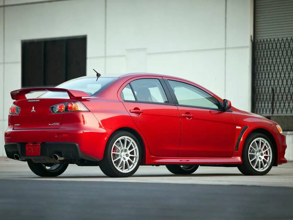 Mitsubishi evo 10. Мицубиси лансер 10 эволюшн. Mitsubishi lancer x 10. Mitsubishi lancer evo 2010. Митсубиси лансер эволю.