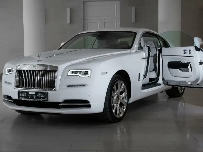 Белый роллс ройс. Роллс Ройс Wraith 2022. Rolls Royce Wraith белый. Rolls-Royce Wraith белый 2022. Роллс Ройс купе 2022.