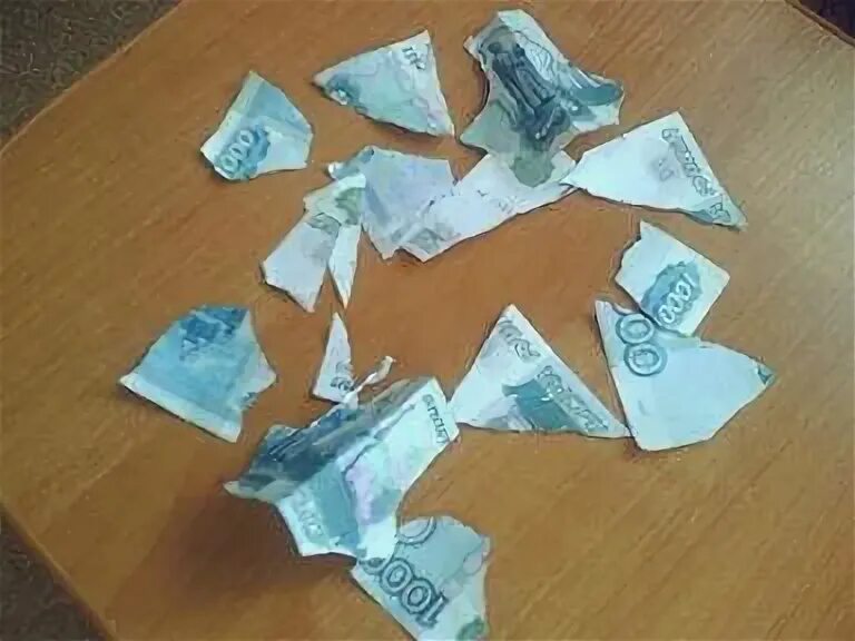 Порванные 1000 рублей. Рваная 1000 рублей. Рваная тысяча рублей. Порванная купюра. Постиранная купюра.