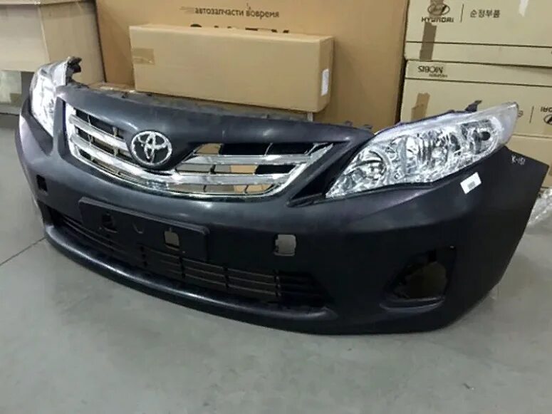 Оригинальные запчасти тойота королла. Бампер передний тойота королла 150. Оригинальные коробка запчастей тойота. Тойота королла фары передние. Пыльник замка капота тойота королла 150.