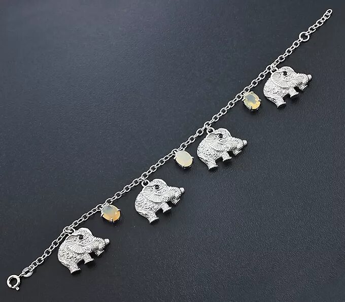 Браслет слоники серебро. Браслет со слониками. Браслет со слоном. Браслет слоны серебро. Золотой браслет слоники.