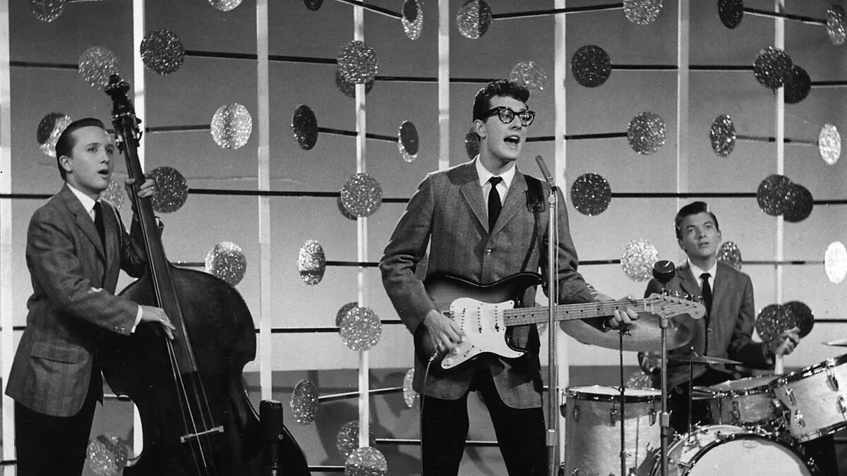 Рок н ролл 70 80 года. Buddy holly. buddy holly and the crickets. рок-н-ролл исполнители бадди холли. рок н ролл 50х-70х.