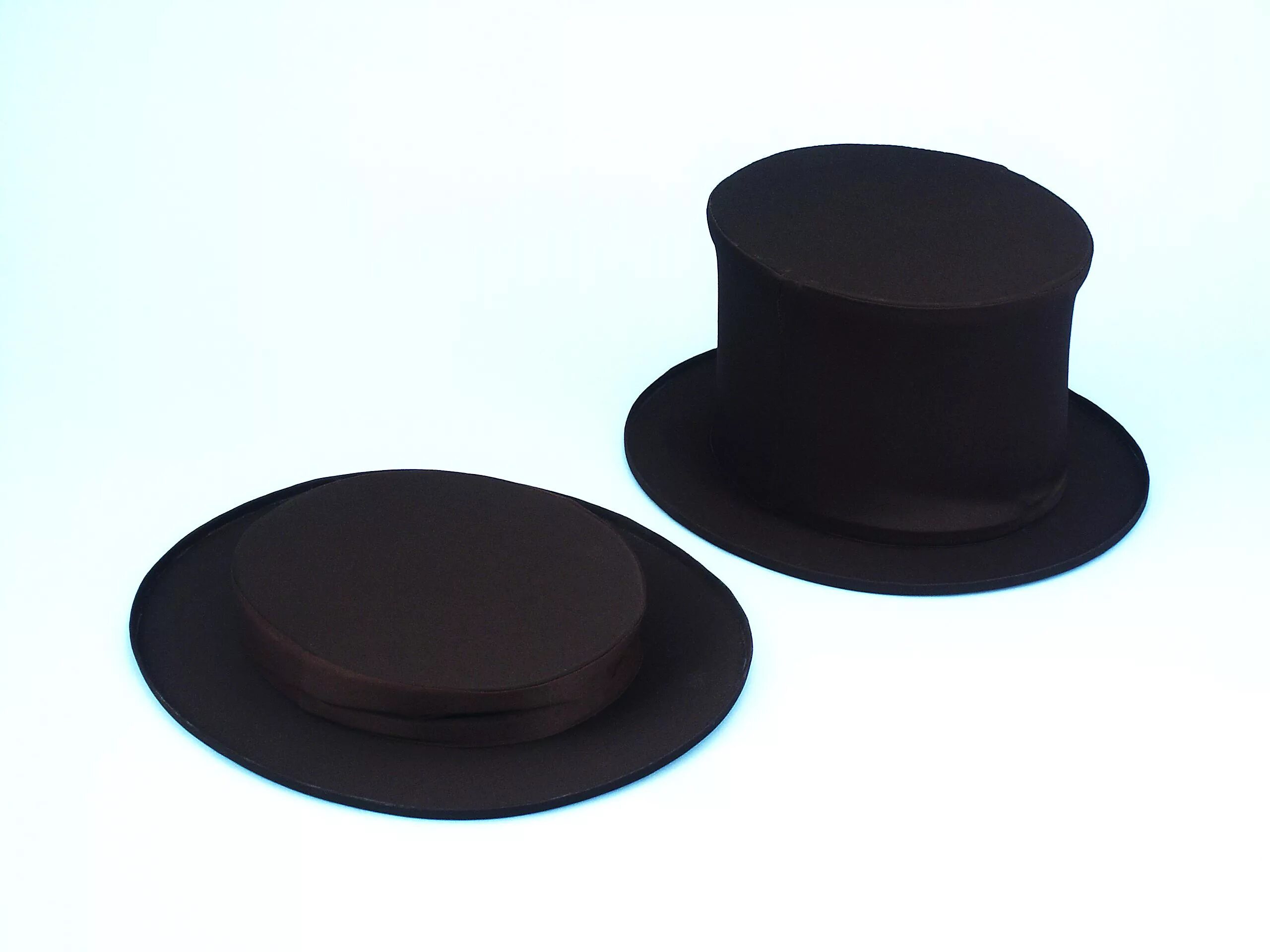 Раскладной цилиндр. Складной цилиндр. Складной цилиндр. Мужской головной убор шапокляк. Складной цилиндр для фокусника.