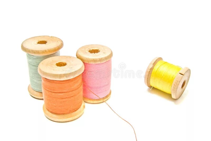 Different thread. Цветные нитки для вышивания. Катушка с волокном. Нитки швейные. Клубок разноцветных ниток.
