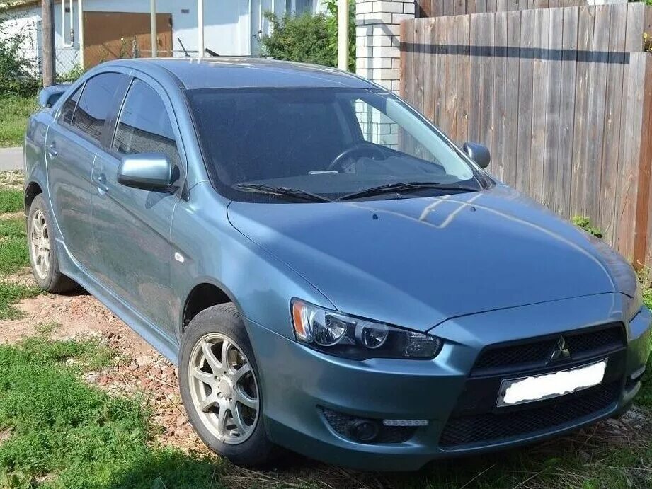 Митсубиси лансер 2010. Mitsubishi Lancer 2010. Мицубиси Лансер машина 2010 года. Митсубиши Лансер 2010 год. Мицубиси Лансер 2010 года 1.5 b/m1.