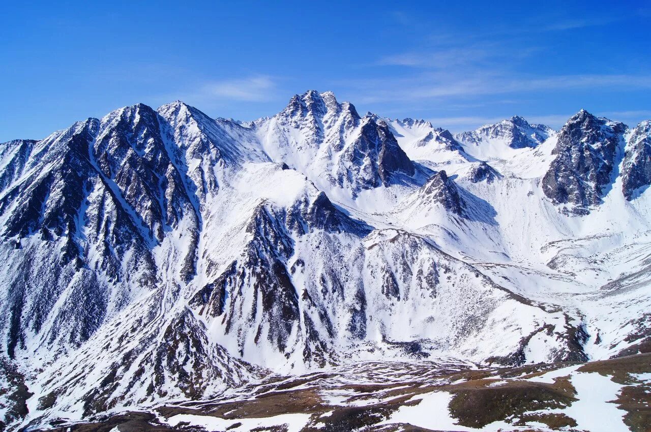 Самая высокая вершина сибири гора. Саяны гора Мунку-Сардык. Гора Мунку Сардык вершина. Восточные Саяны Мунку Сардык. Горы Бурятии Мунку Сардык.