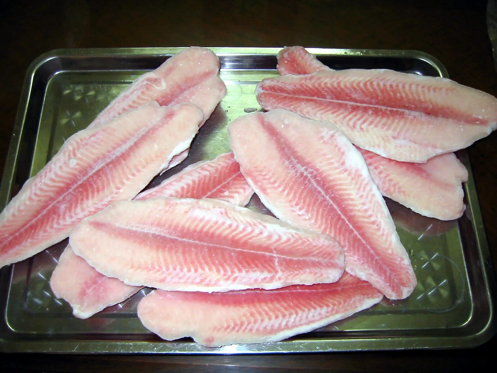 Пангасиус рыба. Жемчужная рыба пангасиус. Филе рыбы пангасиус. Пангасиус розовый рыба.