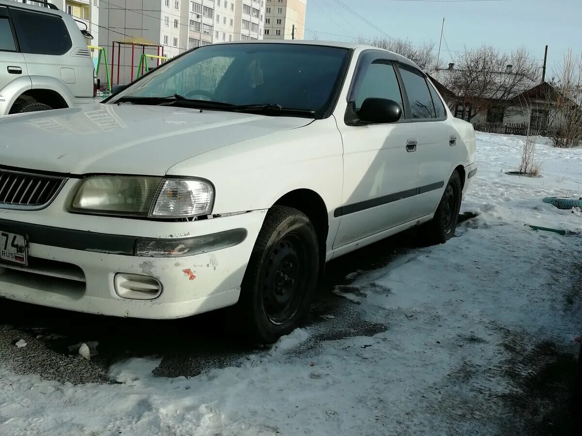 Ниссан санни 2001г. Nissan Sunny 2001. Ниссан Санни 2001 белый. Ниссан Санни 2001 года. Ниссан Санни 2001 года белый.