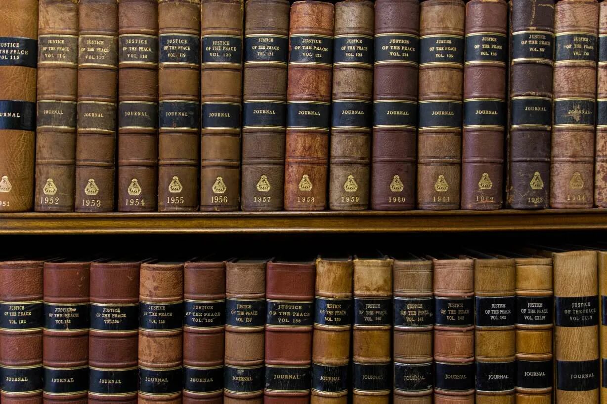 The Law book. Case Law. AP Law book. Old Law books Golden. Justice case