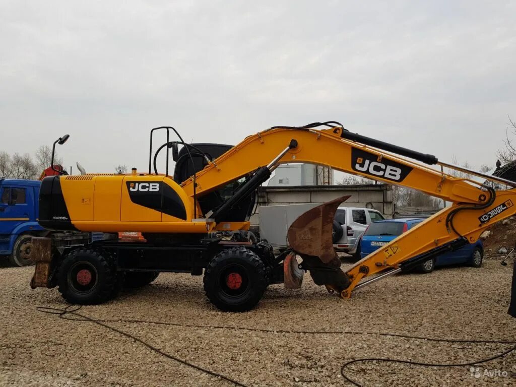 Авито джисиби экскаватор. Экскаватор JCB js200w. Экскаватор колесный JCB, jc200wt2. Экскаватор JCB 200 колесный. JCB js 200w WM.