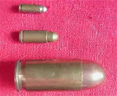 45 acp калибр пистолет. Калибр 40 s w. Револьверный патрон 45 калибра. Калибр 2. Ммд с пистолетом.