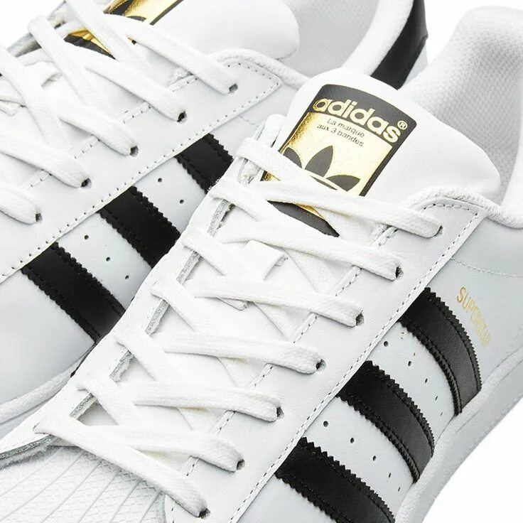 Как завязывать кроссовки адидас. Adidas Superstar 2022. Кеды адидас суперстар. Шнурки adidas Superstar. Адидас кроссовки с шнурки Superstar.