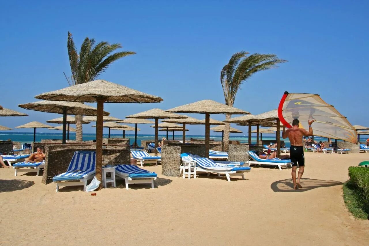 Египет хургада отели 1 линии. Sea star beau rivage 5 египет. sea star beau rivage hurghada 5 хургада. египет хургада отели 5 звезд. sea star beau rivage 5* пляж.