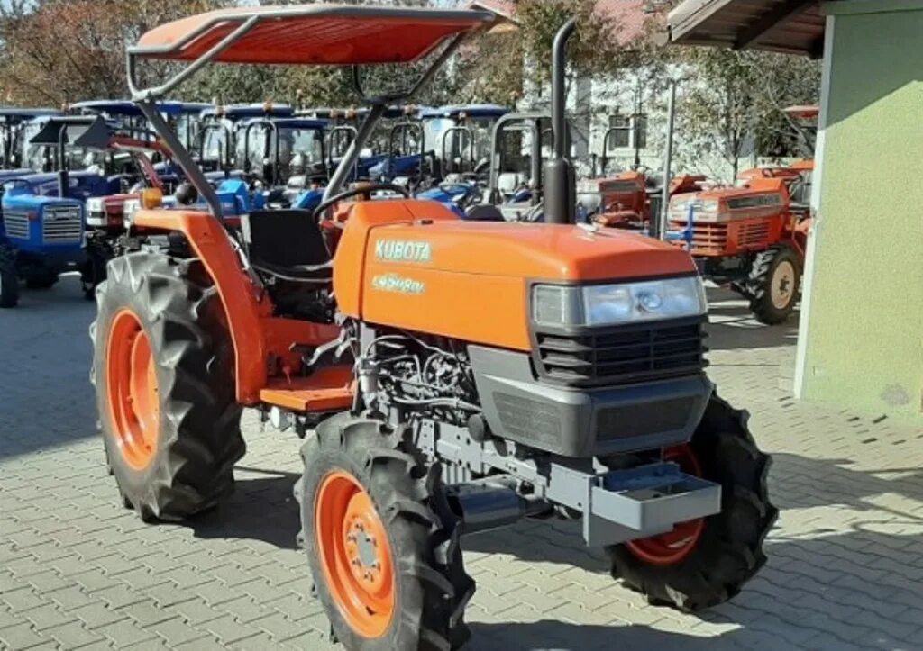 Мини трактор кубота. Kubota l4508. Минитрактор Kubota l3408. Минитрактор Кубота Джи би 20. Минитрактор Кубота YM 1100.