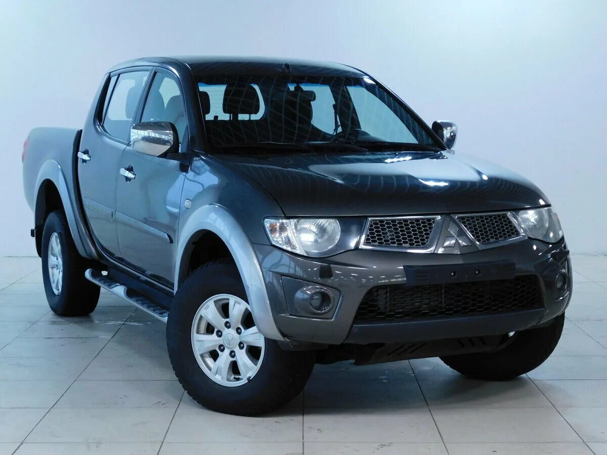 Мицубиси л200 с пробегом. Mitsubishi l200. Mitsubishi l200 IV. Митсубиси л200. Mitsubishi l200 4wd.