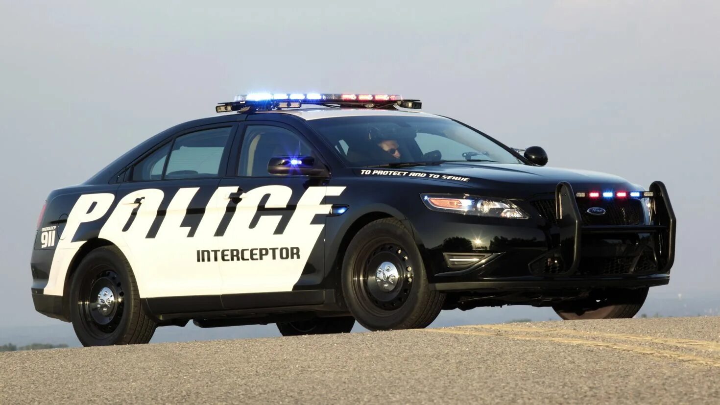 Полицейские машины в америке. Ford Taurus Police Interceptor 2012. Ford Police Interceptor. Ford Taurus Police Interceptor. Ford Taurus 2013 Police Interceptor.