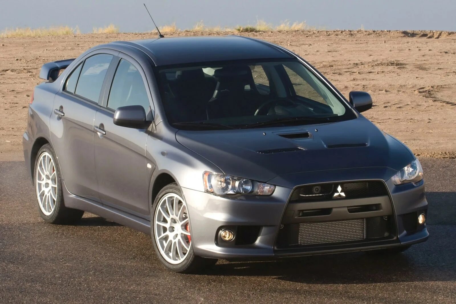 Купить лансер в московской области. Mitsubishi Lancer Evolution 2013. Mitsubishi Lancer Evolution x 2012. Лансер 10 Эволюшн 2012. Митсубиси Лансер 10.